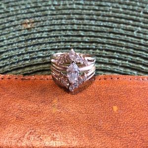 14K gold, marquise-cut diamond lady’s wedding ring (size 6).